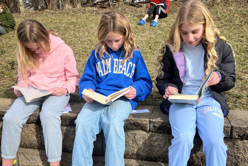 Wilson students reading outside